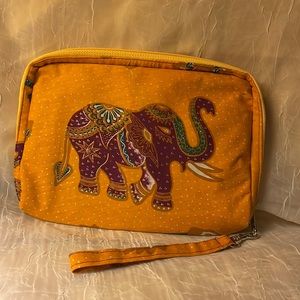Elephant wristlet/makeup case-New with out. Detachable strap. Orange &…